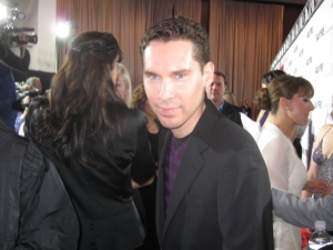 Acclaimed director Bryan Singer enters the red carpet premiere in style!