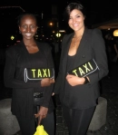 Sexy taxi girls were waiting outside the stores to assist guests in getting cabs to other parties. 