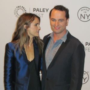 Actors Keri Russell and Matthew Rhys share a joke on the red carpet